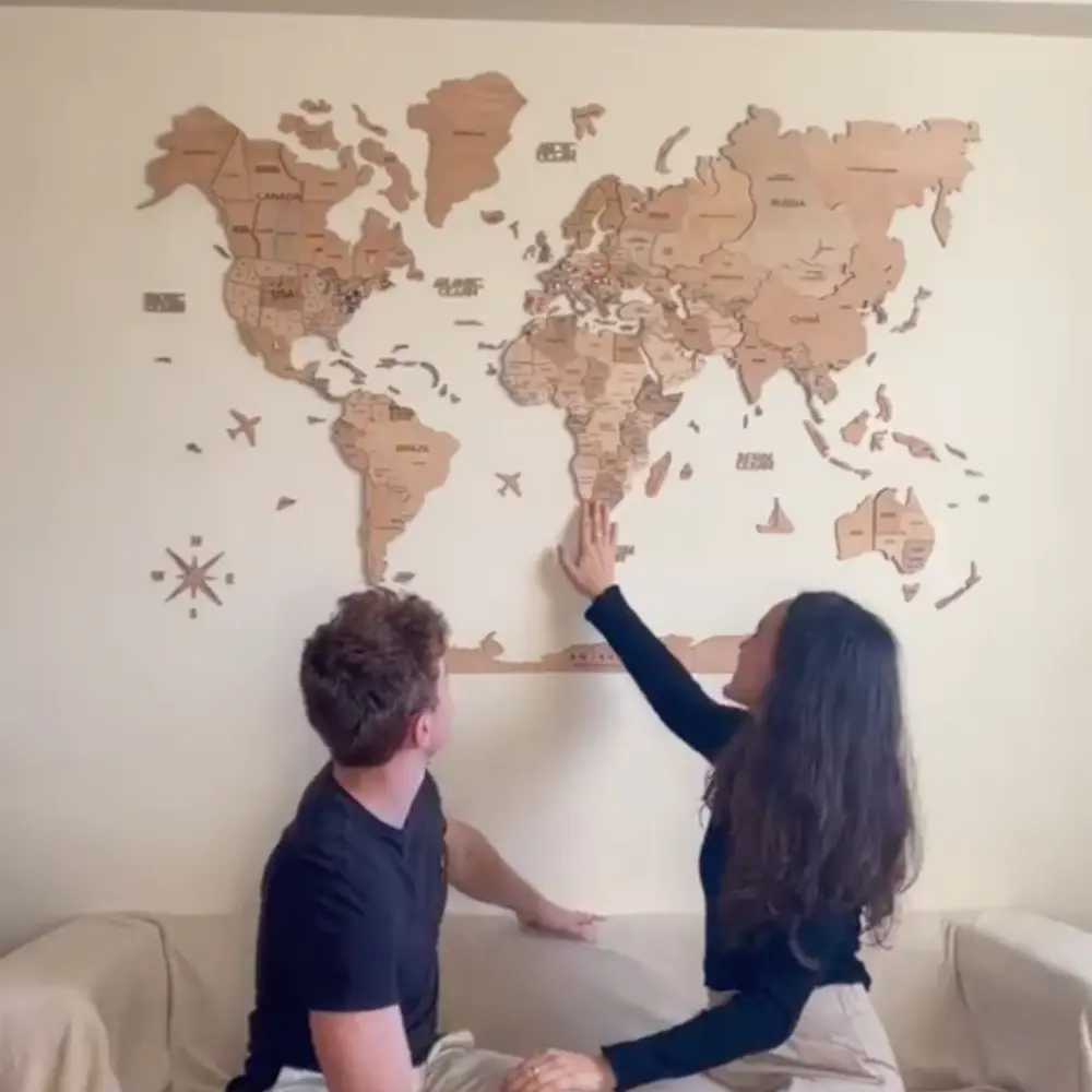 Wide wooden world map installation